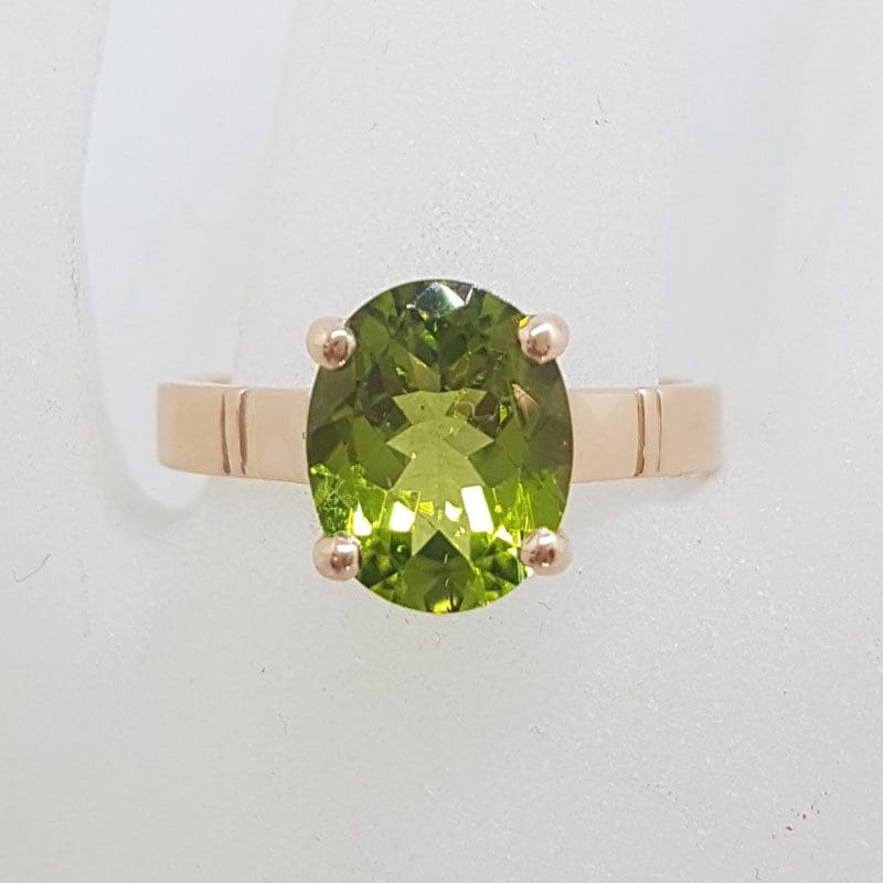 9ct Rose Gold Oval Claw Set Peridot Ring