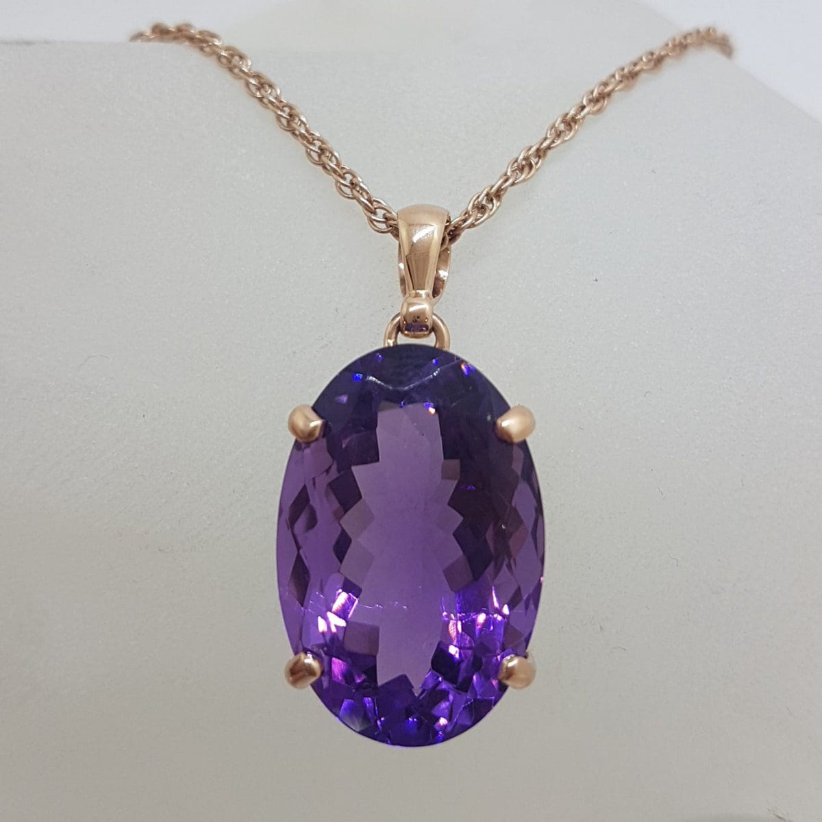9ct Rose Gold Oval Amethyst Claw Set Pendant on Gold Chain