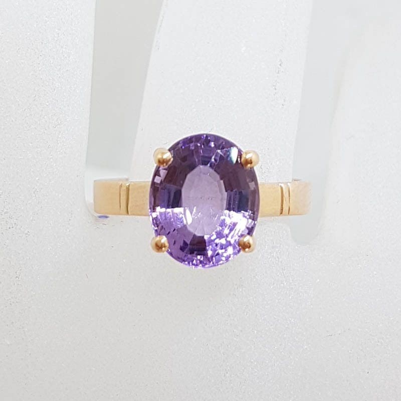 9ct Rose Gold Oval Claw Set Amethyst Ring