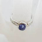 18ct White Gold Oval Bezel Set Natural Blue Ceylon Sapphire with Channel Set Diamond Ring
