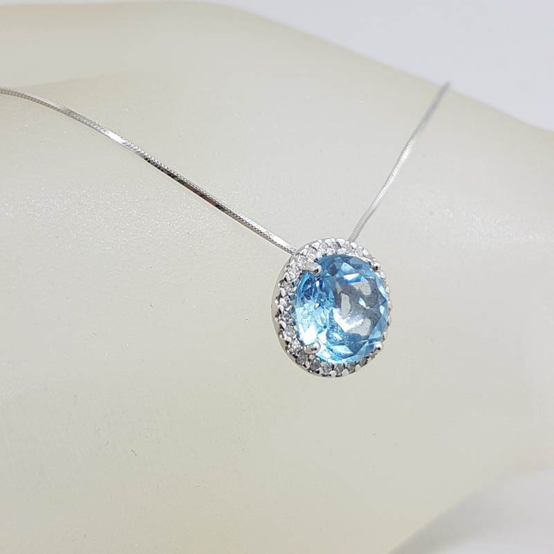 10ct White Gold Oval Blue Topaz with Halo Setting Diamonds Pendant on Gold Chain