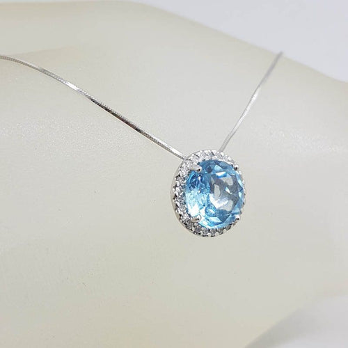 10ct White Gold Oval Blue Topaz with Halo Setting Diamonds Pendant on Gold Chain