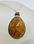 Sterling Silver Oval Natural Baltic Amber Bezel Set Pendant on Silver Chain
