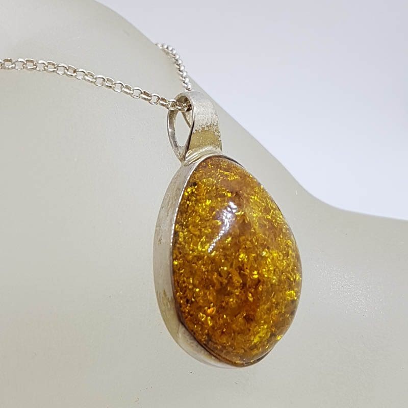 Sterling Silver Oval Natural Baltic Amber Bezel Set Pendant on Silver Chain