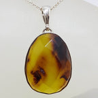 Sterling Silver Faceted Oval Natural Green Colombian Amber Pendant on Silver Chain