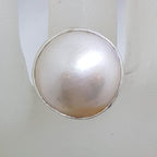 Sterling Silver Round White Mabe Pearl with Ornate Pattern Along Side Ring