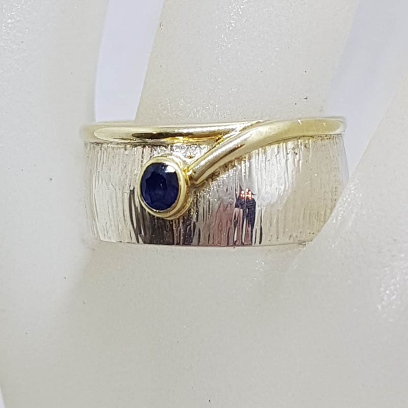 Sterling Silver and Plated Wide Patterned Band Ring with Oval Sapphire