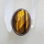 Sterling Silver Large Oval Faceted Tiger Eye Ring - Patterned Rim