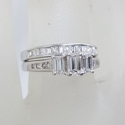 18ct White Gold Baguette and Princess Cut Diamond Trilogy Engagement Ring and Wedding Ring Set - Channel Set and Claw Set