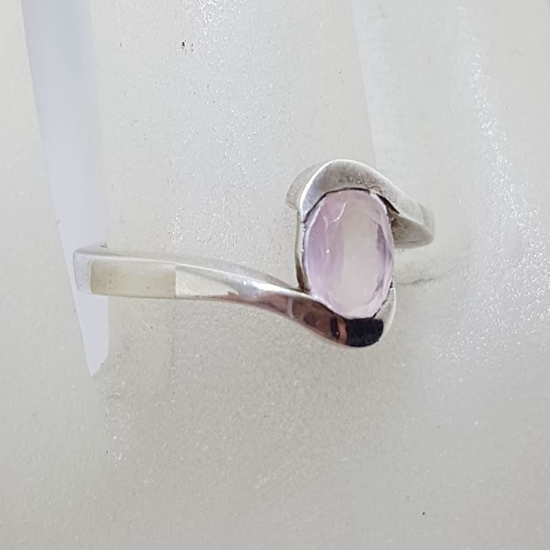 Sterling Silver Oval Rose Quartz in Curved Ring