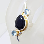 Sterling Silver Elongated Teardrop / Pear Shape Onyx with 2 Round Topaz Curved Ring