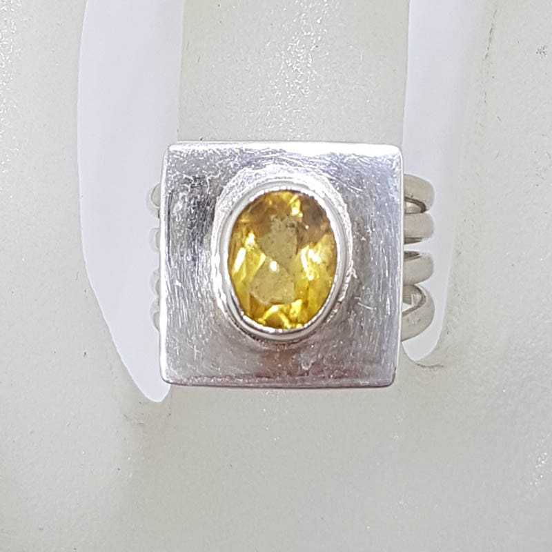 Sterling Silver Oval Bezel Set Citrine in Rectangular Ring