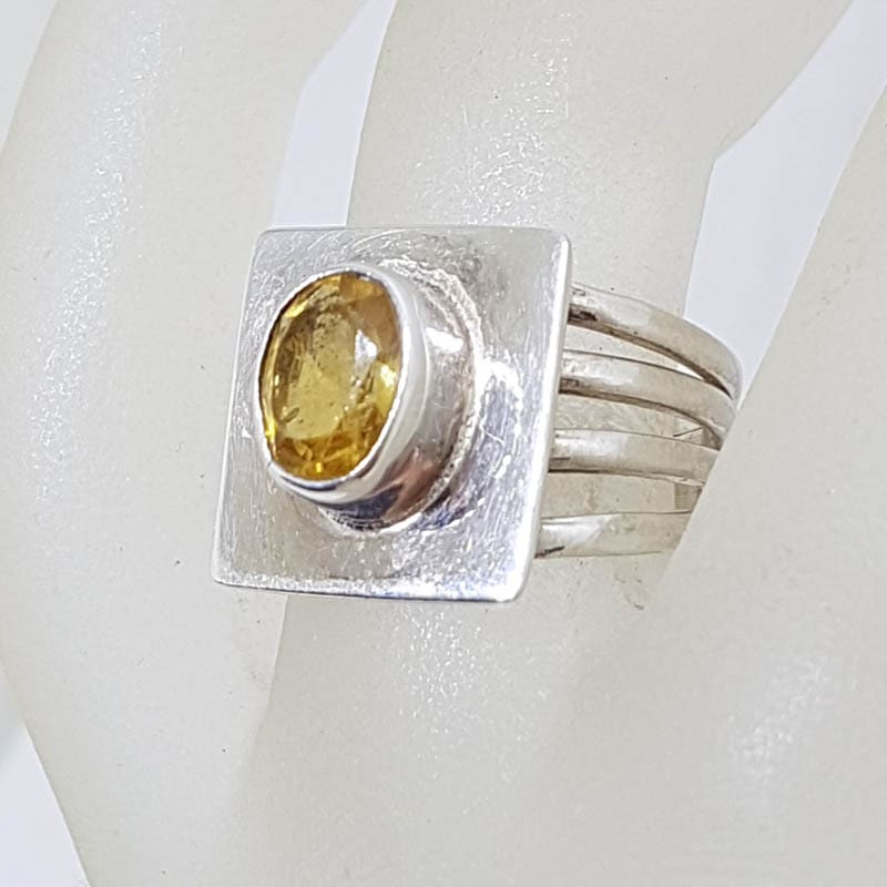 Sterling Silver Oval Bezel Set Citrine in Rectangular Ring