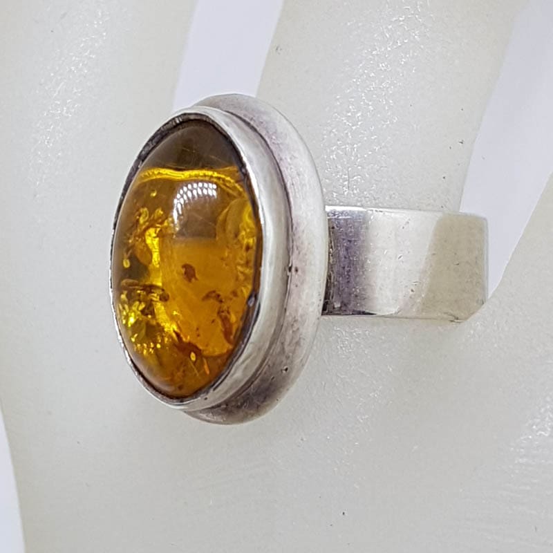 Sterling Silver Oval Bezel Set Amber Ring