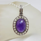 Sterling Silver Amethyst Faceted Oval in Ornate Rimmed Setting Pendant on Silver Chain