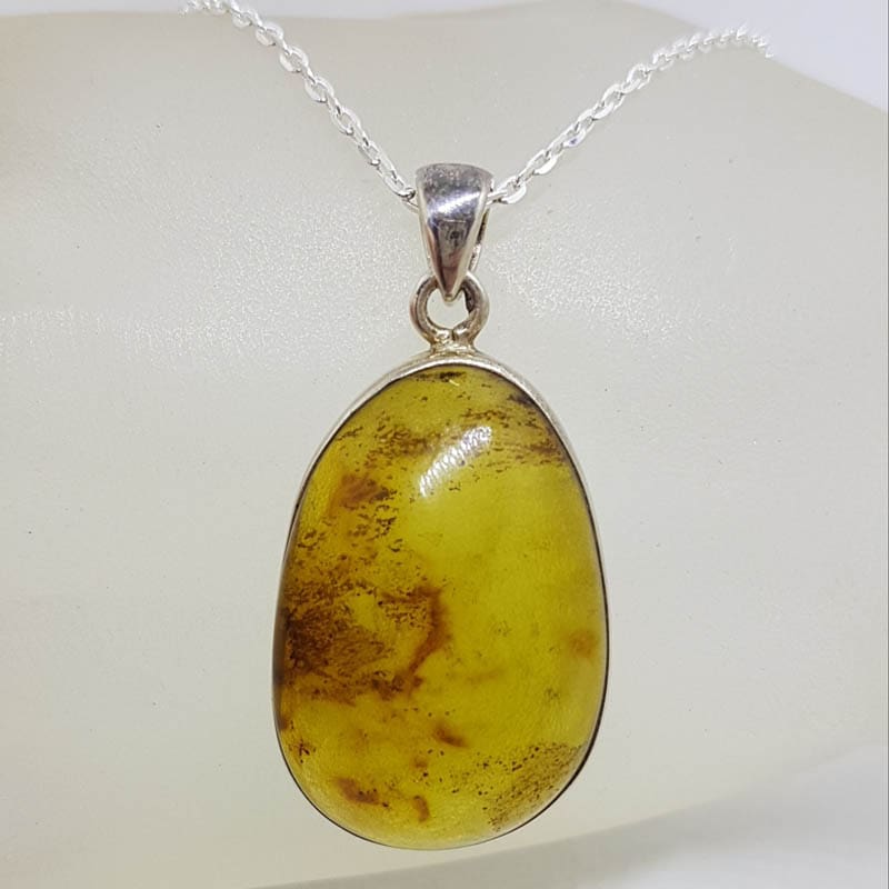 Sterling Silver Amber Large Oval Bezel Set Pendant on Silver Chain