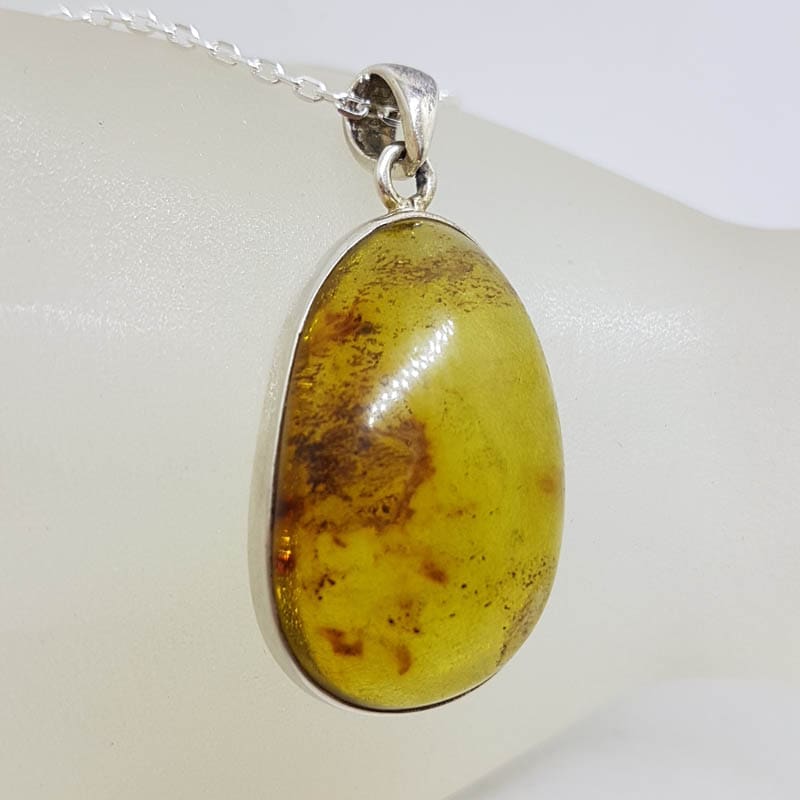Sterling Silver Amber Large Oval Bezel Set Pendant on Silver Chain