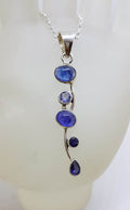 Sterling Silver Tanzanite Cabochon Cut and Faceted Long Twisted Pendant on Silver Chain