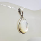 Sterling Silver Mother of Pearl Oval Bezel Set Pendant on Silver Chain