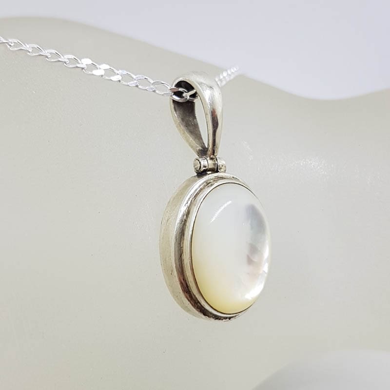 Sterling Silver Mother of Pearl Oval Bezel Set Pendant on Silver Chain