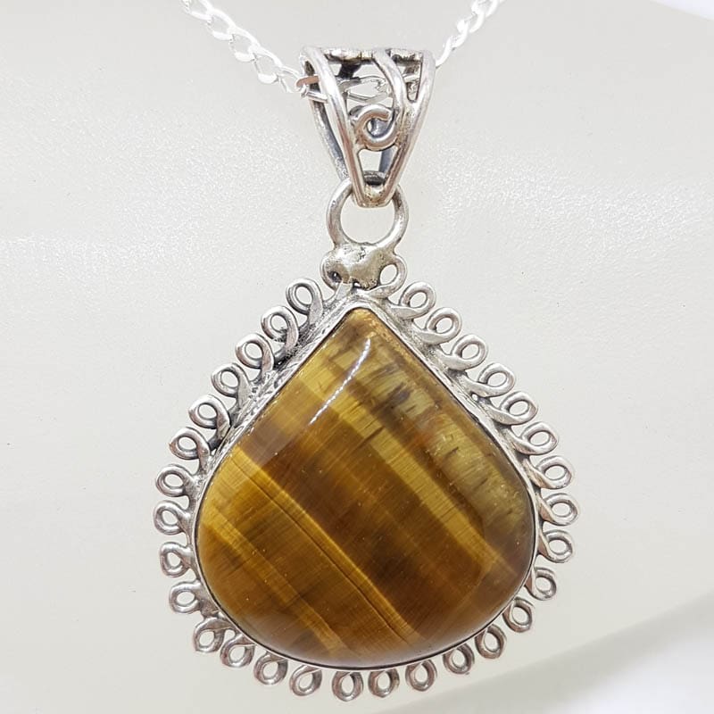 Sterling Silver Tiger Eye Cabochon Cut Teardrop / Pear Shape Twist Rim Pendant on Silver Chain