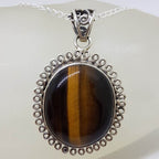 Sterling Silver Tiger Eye Cabochon Cut Oval Twist Rim Pendant on Silver Chain