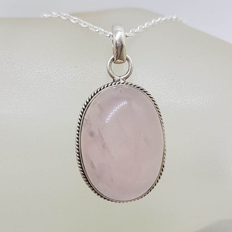 Sterling Silver Rose Quartz Cabochon Cut Bezel Set Oval with Twist Rim Pendant on Silver Chain