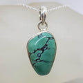 Sterling Silver Natural Turquoise Freeform Shape Pendant on Silver Chain