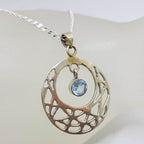 Sterling Silver Topaz Drop in Ornate Open Patterned Circle Pendant on Silver Chain