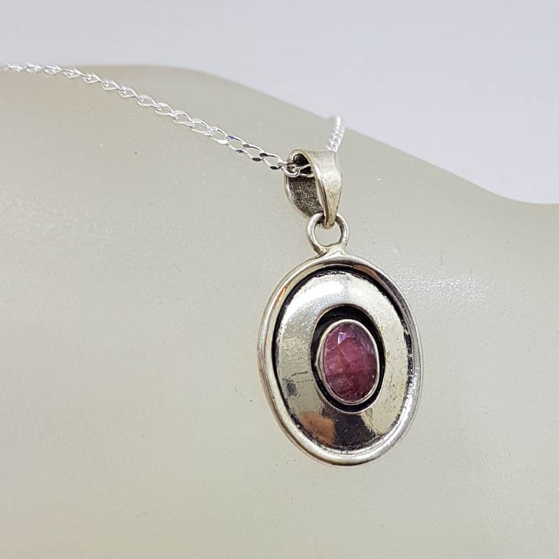 Sterling Silver Oval Rimmed Ruby Pendant on Silver Chain