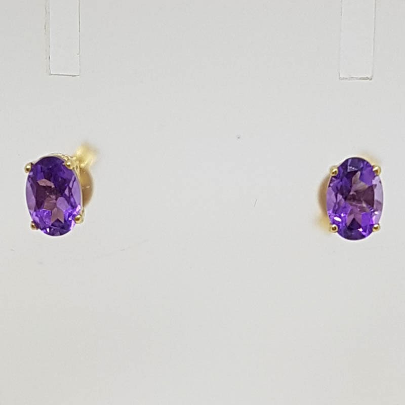 9ct Yellow Gold Amethyst Claw Set Oval Studs / Earrings