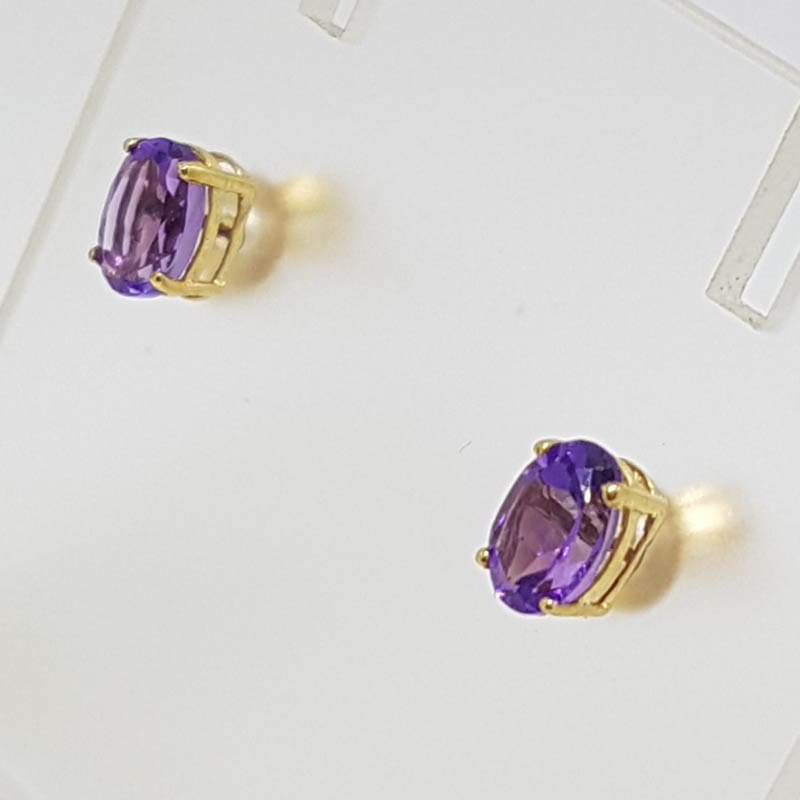 9ct Yellow Gold Amethyst Claw Set Oval Studs / Earrings