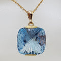 9ct Yellow Gold Large Square Laser Cut Blue Topaz Pendant on 9ct Chain