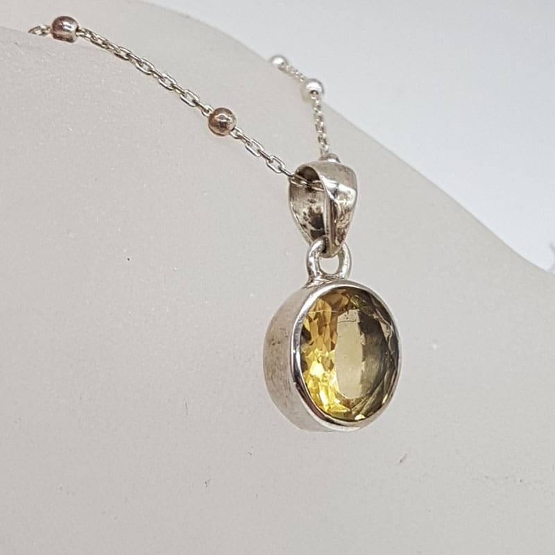 Sterling Silver Oval Citrine Pendant on Silver Chain