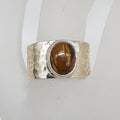 Sterling Silver Wide Beaten Design Band with Oval Tiger Eye Ring