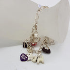 Sterling Silver Enamel 10 Multi-Charms Bracelet Includes Heart, Dog, Handbag Etc