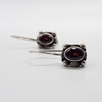 Sterling Silver Oval Garnet Ornate Earrings