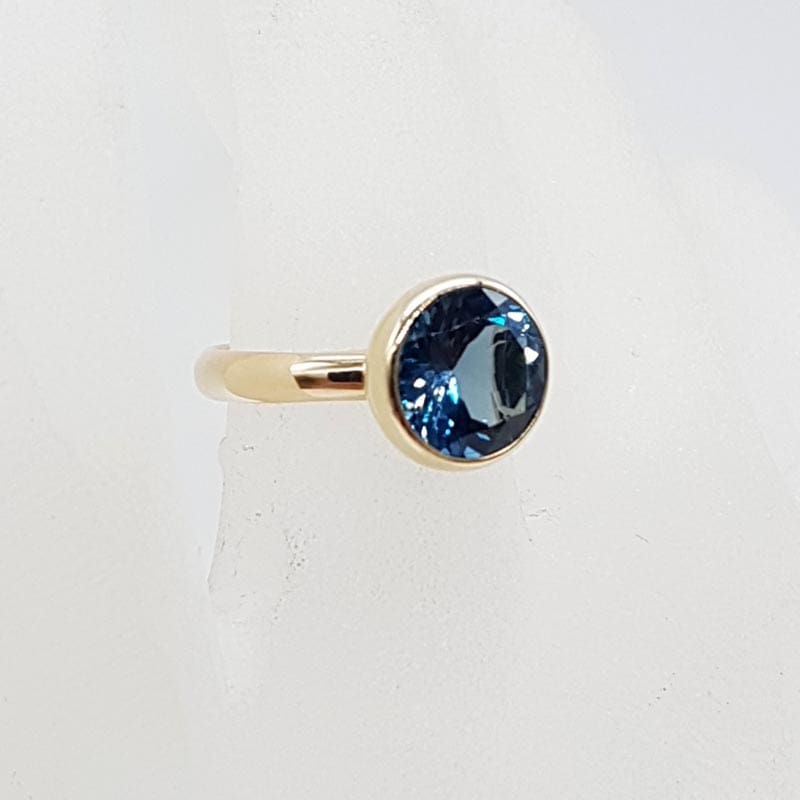 9ct Yellow Gold London Blue Topaz Round Bezel Set Ring