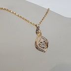 9ct Yellow Gold Diamond Heart Twist Pendant on Gold Chain