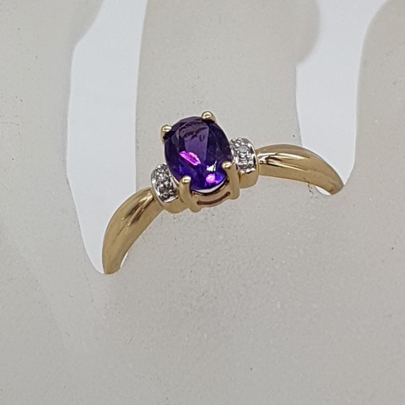 9ct Yellow Gold Oval Amethyst Claw Set with Diamonds Ring