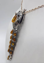 Sterling Silver Natural Baltic Amber Long Jointed Snake Pendant on Silver Chain