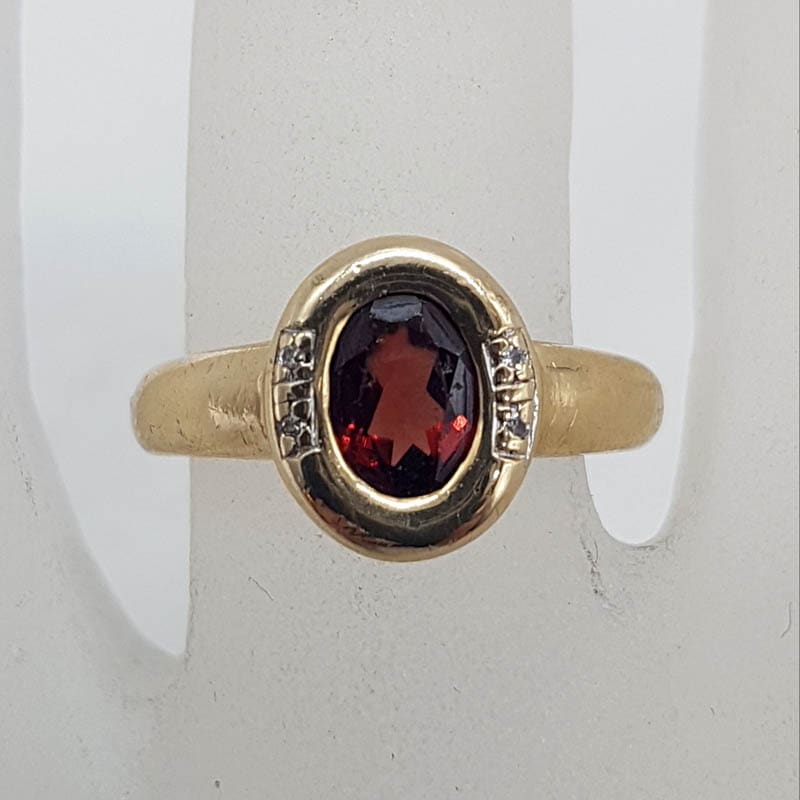 9ct Yellow Gold Oval Bezel Set Garnet with Diamonds Ring