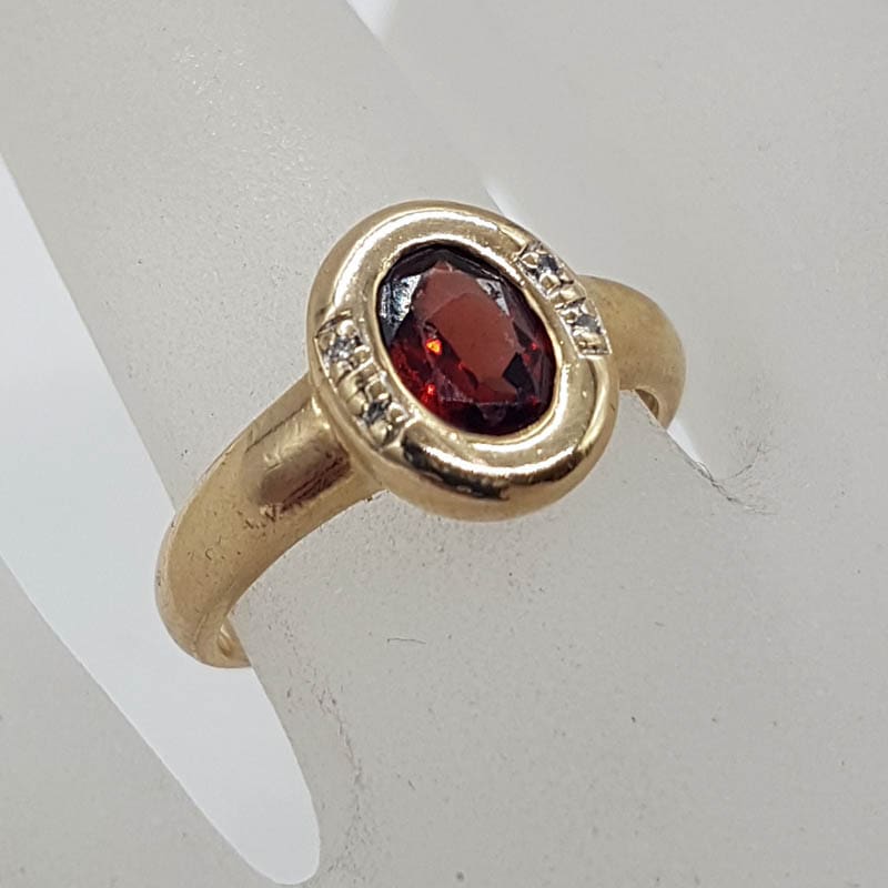 9ct Yellow Gold Oval Bezel Set Garnet with Diamonds Ring