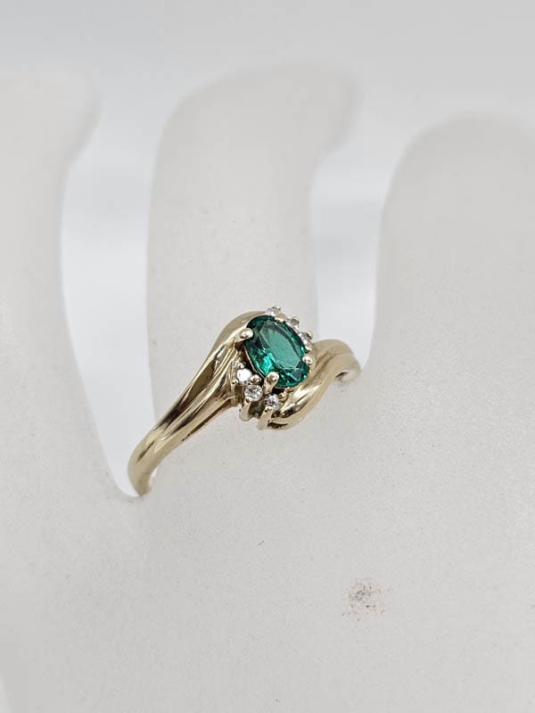 9ct Yellow Gold Created Emerald with Diamond Oval Curved Ring