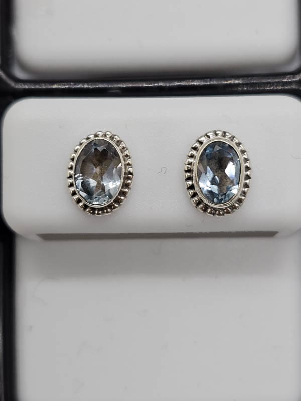 Sterling Silver Topaz Oval Twist Rim Studs Earrings