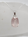 Sterling Silver Rose Quartz Oval Faceted Claw Set Pendant on Silver Chain