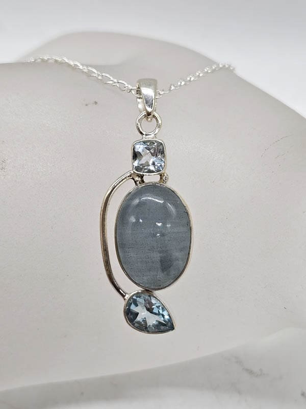 Sterling Silver Aquamarine and Topaz Twist Pendant on Silver Chain