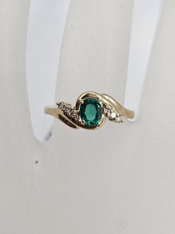 9ct Yellow Gold Oval Emerald and Diamond Twist Ring