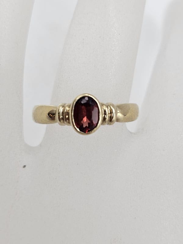 9ct Yellow Gold Garnet Oval Bezel Set Ring