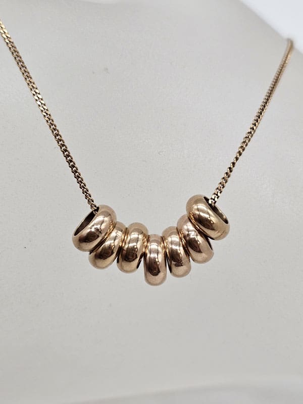 9ct Yellow Gold Seven Lucky Rings Pendant on Gold Chain